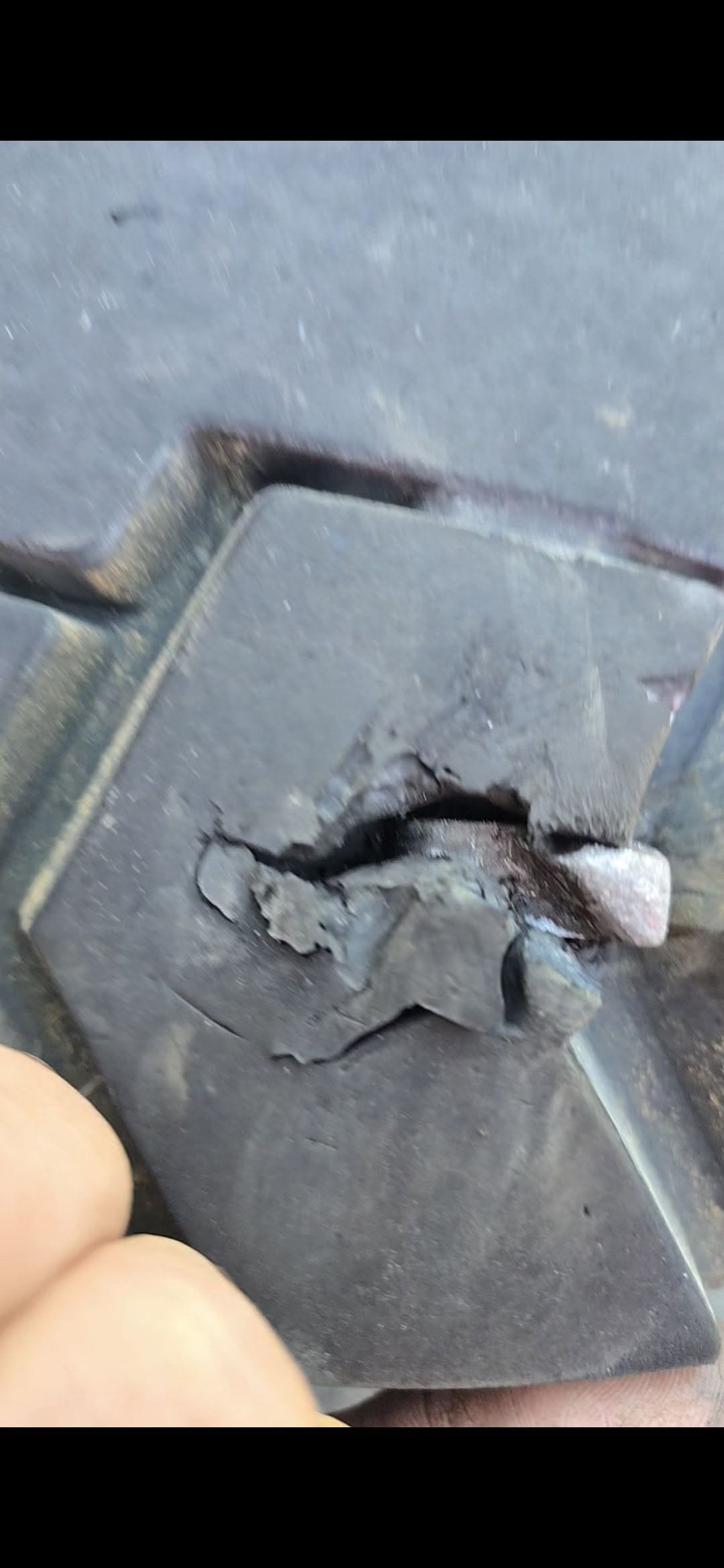 Damage caused by pliers puncturing a tyre