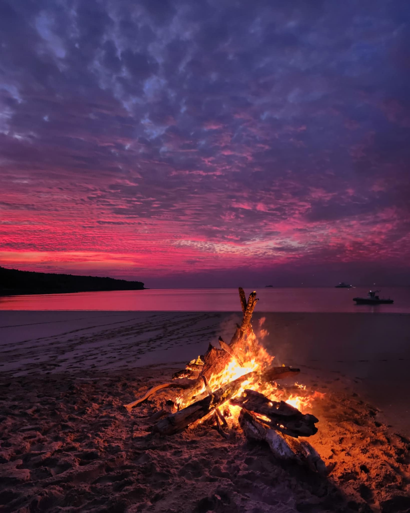 Donal Sullivan beside a campfire while working in the Australian cattle industry