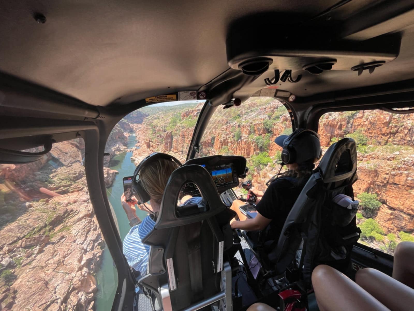 View from inside a helicopter during commercial flying operations in Western Australia