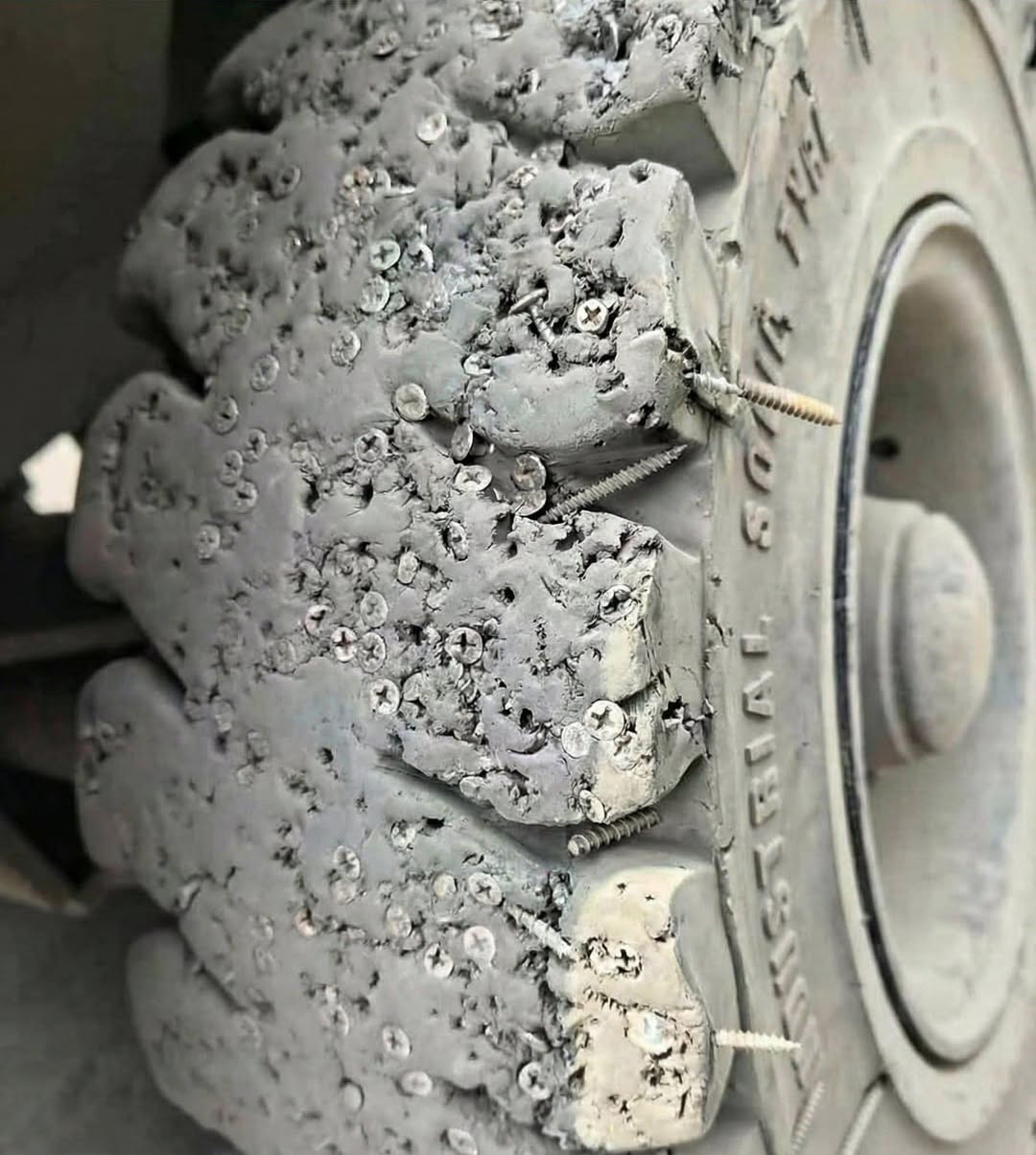 Forklift tyre containing dozens of screws