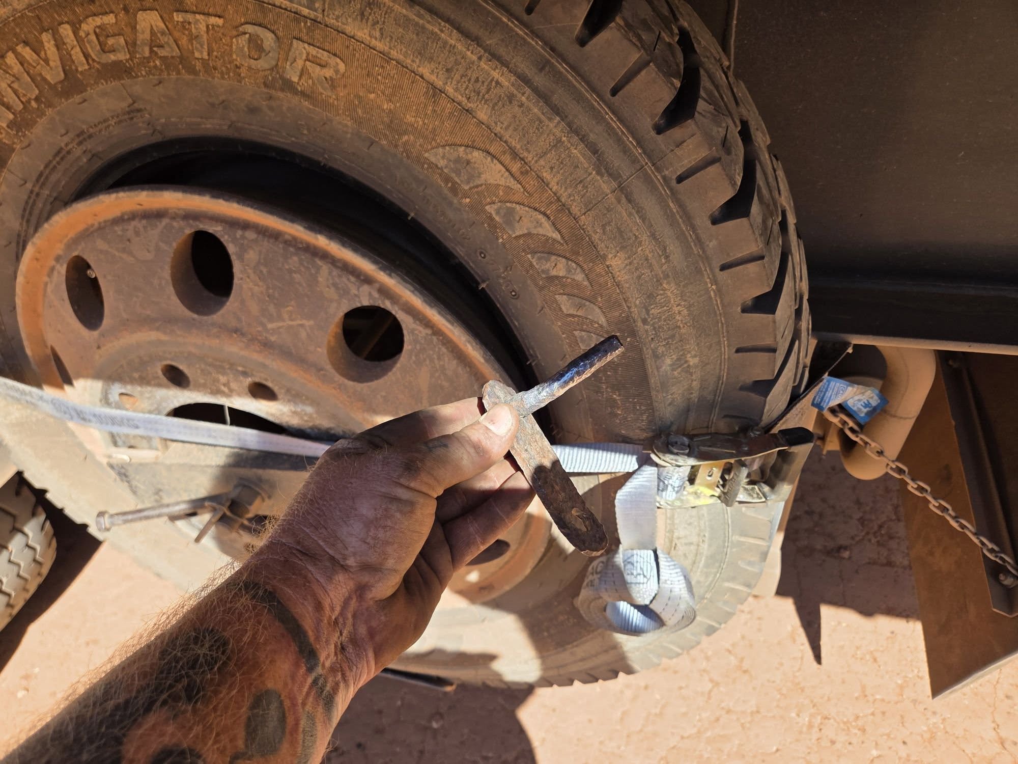Spring-hanger shackle removed from a tyre in Cape York