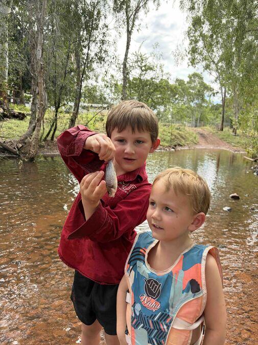 Holly Gorroick and the children fishing during the wet season in the Northern Territory